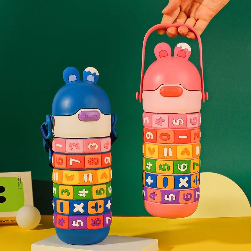 Two colorful children's water bottles with number and letter patterns on a green background.